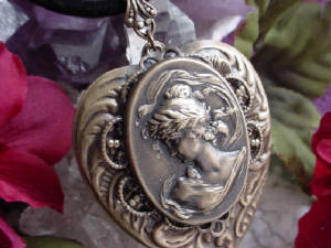 An Oxidized Brass Heart & Cameo Pendant