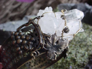 This Hand Oxidized Filigree Cuff Bracelet Is Topped With A Quartz Crystal Cluster And An Oxidized Brass Grape Vine. The Top (Focal Pieces) Were Wired (Or "Sewn") Onto The Cuff Using 22g Oxidized Brass Wire  