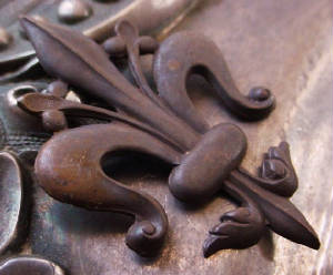 Old Fleur De Lis In Oxidized Brass