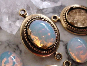 Old Connector Setting Custom Plated In 18K Antique Gold. Shown With A Vintage 10x8 Fire Opal Art Glass Stone